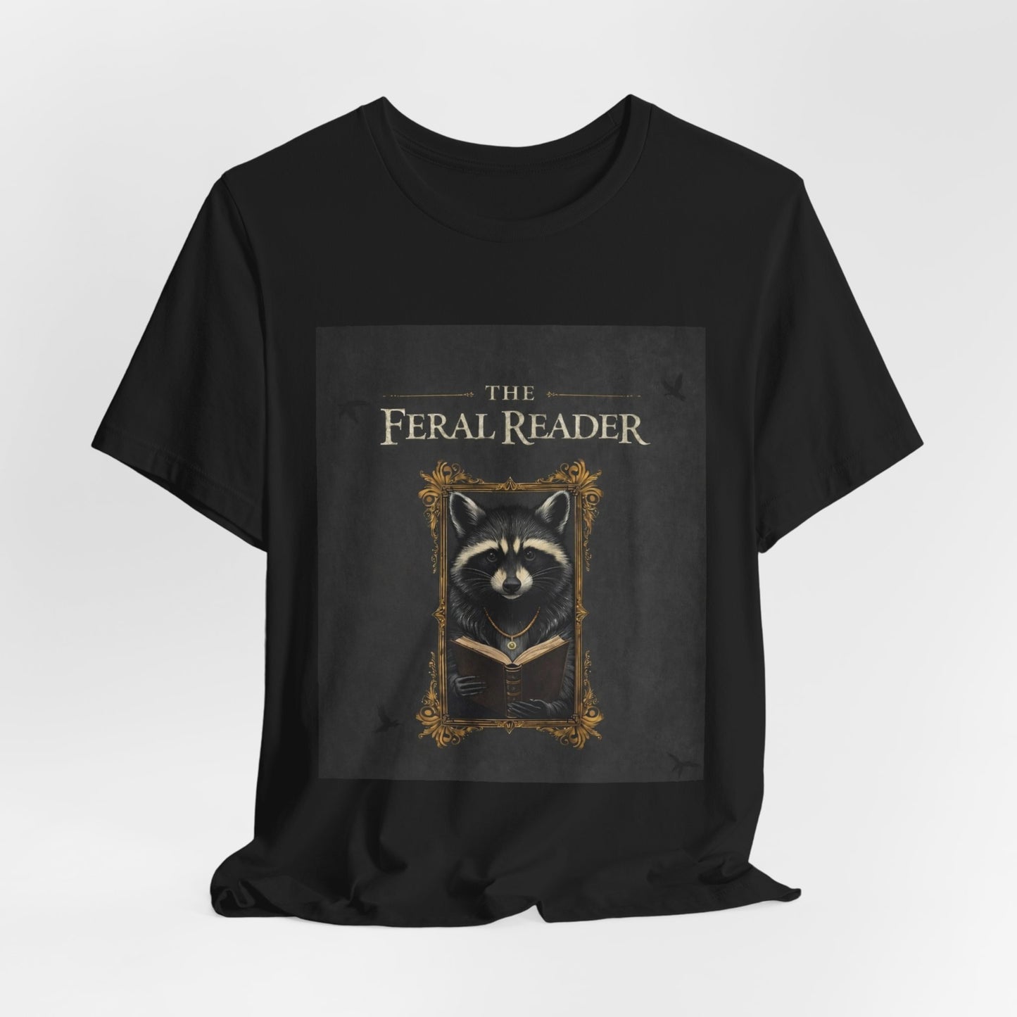 The Feral Reader T‑Shirt — Raccoon Book Lover Graphic Tee